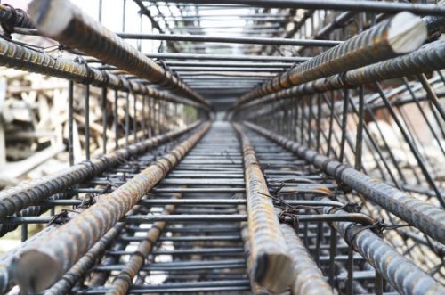 depositphotos_43740657-stock-photo-stock-rebar-at-constuction